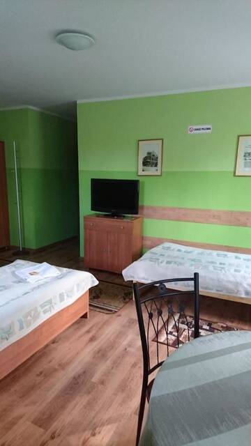 Фото номера Трехместный номер Отель Hotelik WARMIA -Pensjonat, Hostel г. Лидзбарк-Варминьски 3